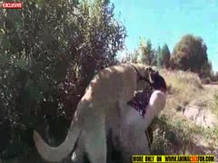 In the jungle, a girl captured a fucking dog.
